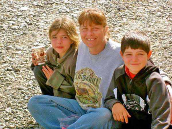 Photo of Sue Aikens with her Grand Children.