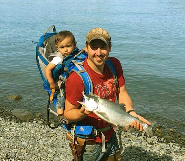 Image of The Last Alaskans cast Scott Nelson with his son