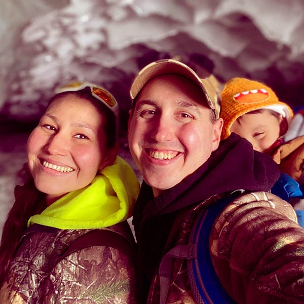 Image of Scott with wife Krin along with their son At Castner Glacier Alaska.