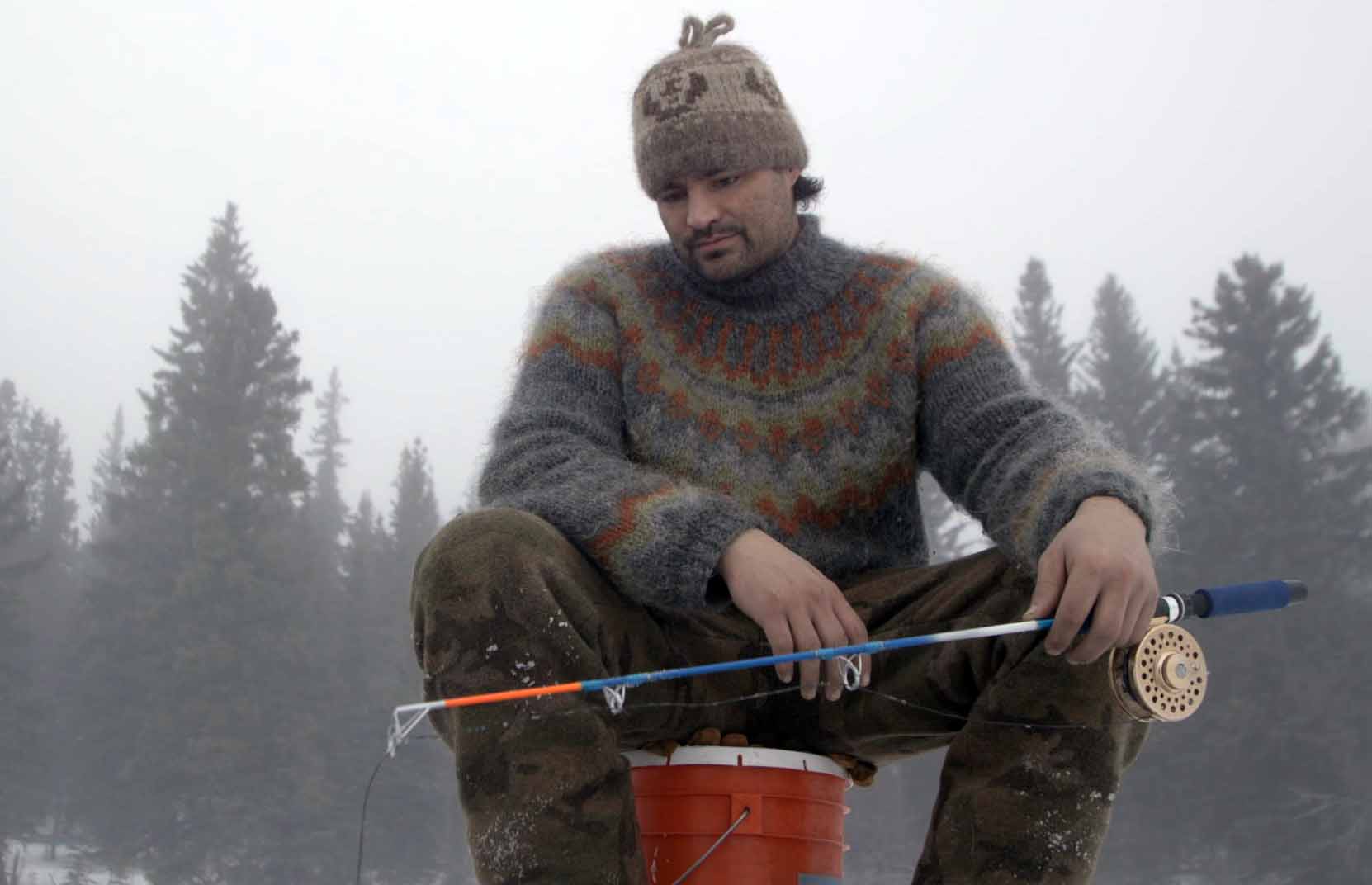 Photo of Michael Manzo fishing.